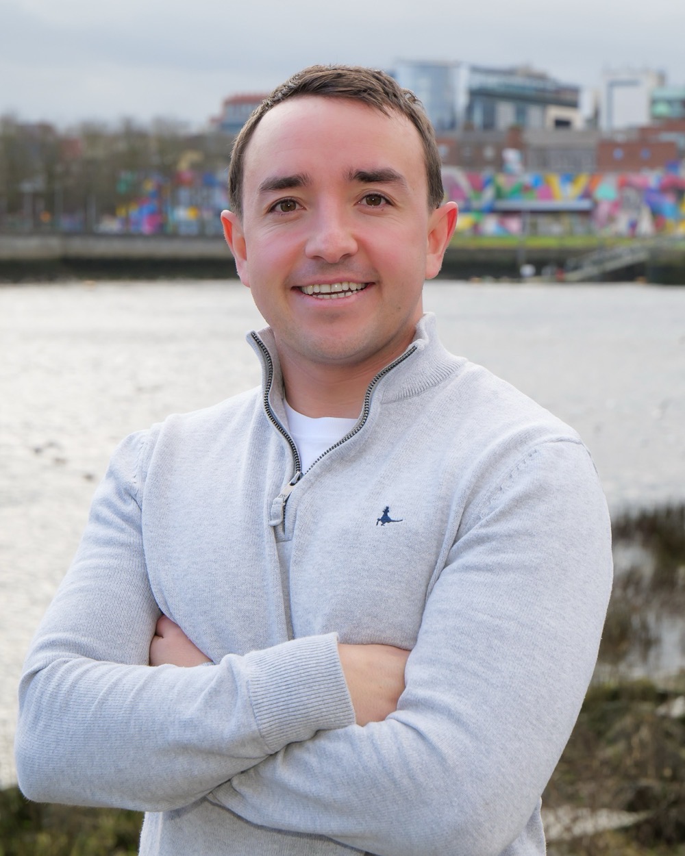 Gareth Morrissey standing in front of the River Shannon in Limerick
